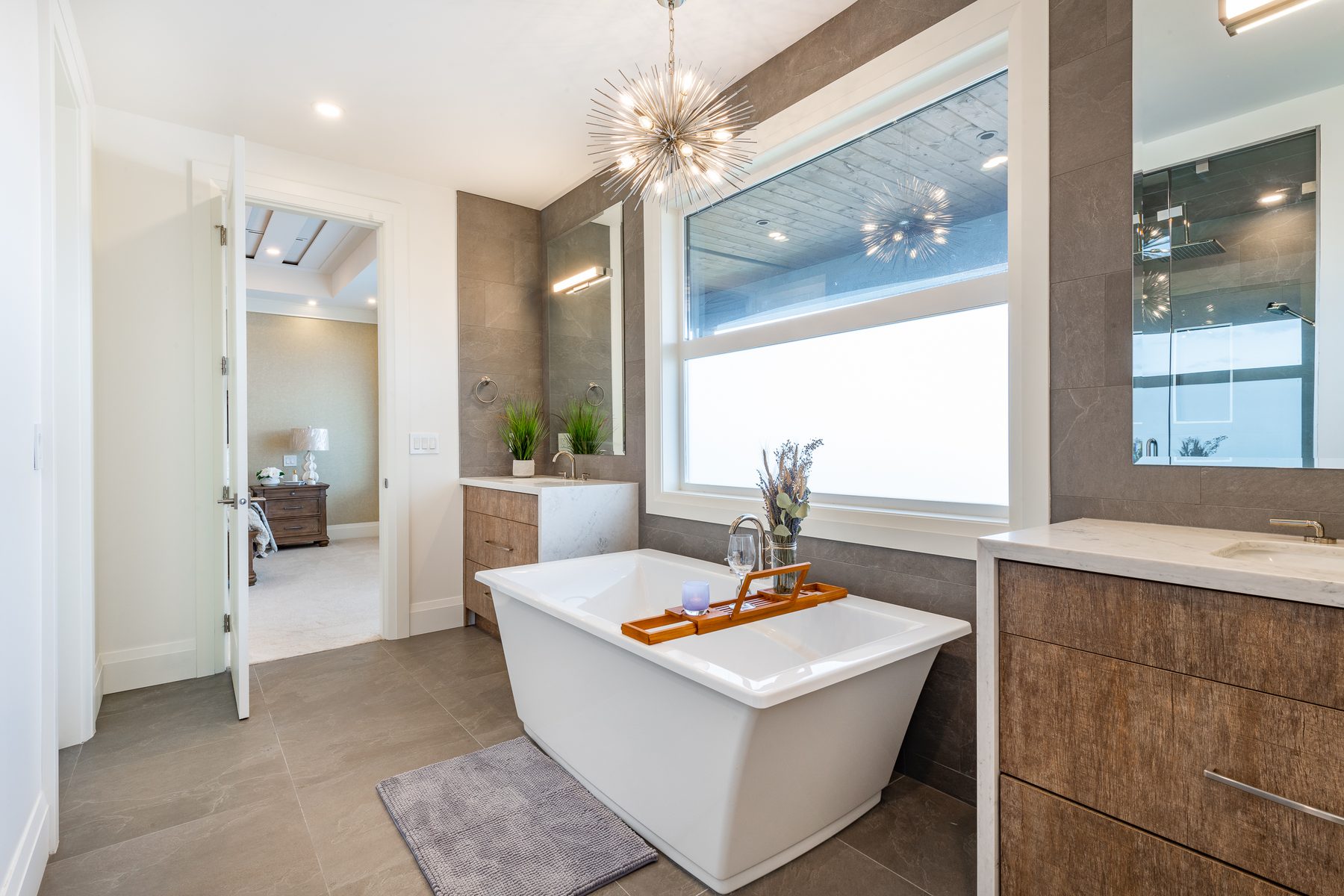 Finished bathroom or living space, wide shot showing tile and millwork detail