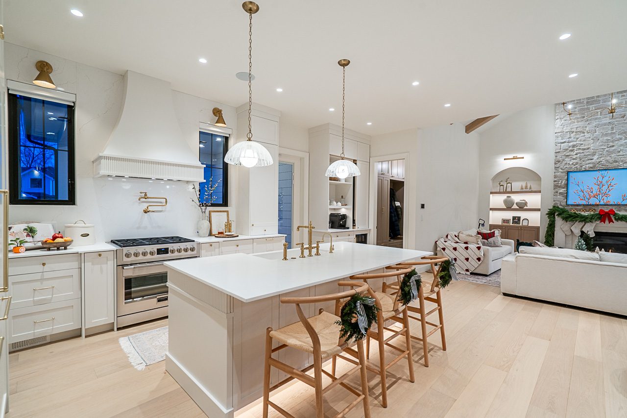Kitchen plan being reviewed at the table, or an overhead view of a finished layout