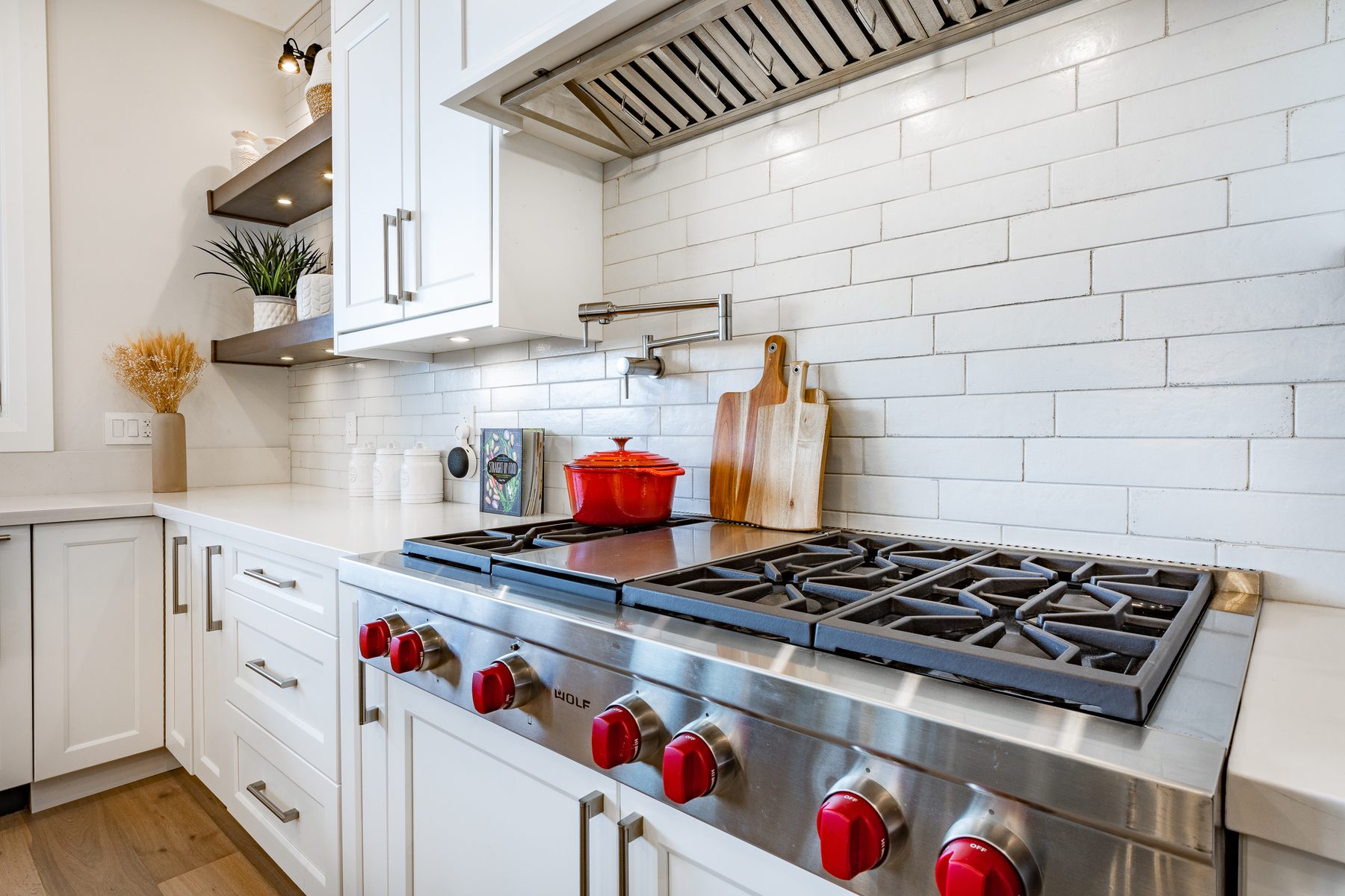 Close-up of backsplash, lighting and hardware details