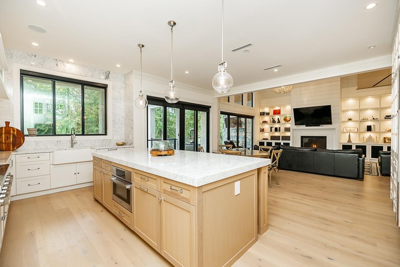 Finished kitchen, wide shot with island and full run of cabinetry